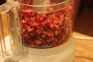 chopping cranberries in the food processor