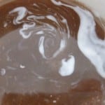 swirling coffee and cream