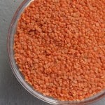 large bowl of dried red lentils