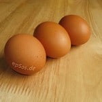 three brown eggs