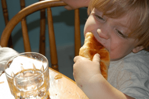 boy eating brioche