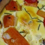 winter squash quiche with tomatoes, chives, cheese and whole-wheat oil crust