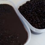 freshly cooked containers of black beans