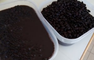 freshly cooked containers of black beans